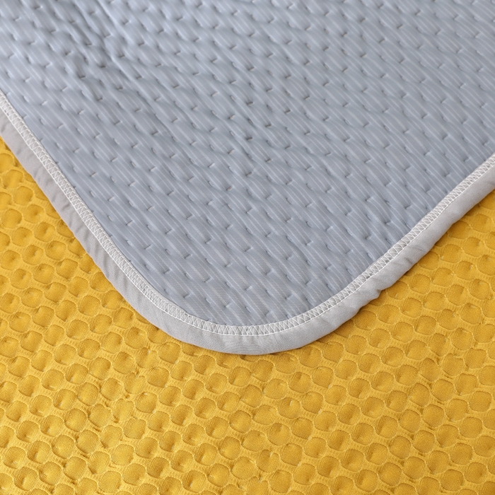 91家纺网 家纺一手货源 找家纺 琪琪阁2023新款华夫格针织提花亲肤舒适多功能凉感夏被 杏黄