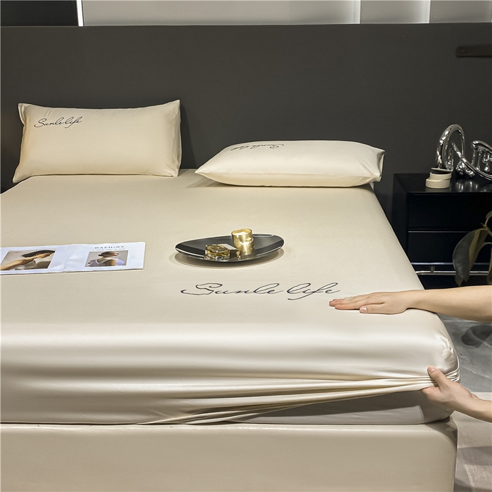 91家纺网 家纺一手货源 找家纺 古吉梦2024新款S刺绣A类抗菌防螨-冰丝床笠三件套 S刺绣-奶昔白