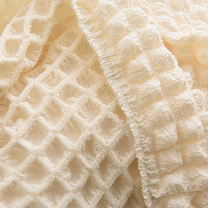 91家纺网 家纺一手货源 找家纺 启博家纺 2023新款泡泡纱弹力半圆形沙发套 乳白