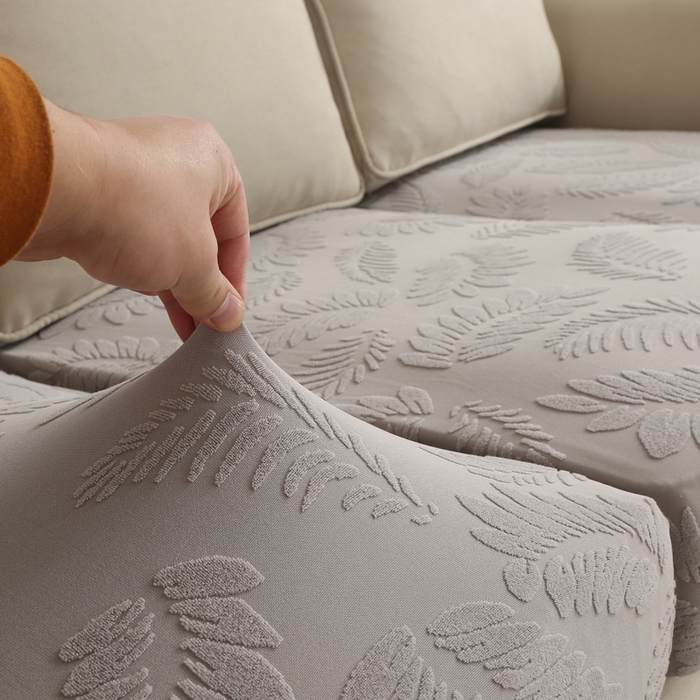 91家纺网 家纺一手货源 找家纺 兴妮雅家纺 2023新款大树叶防水弹力立体浮雕提花组合沙发坐垫套 浅灰