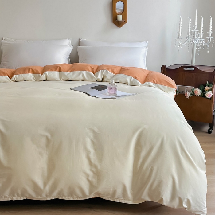 91家纺网 家纺一手货源 找家纺 艾迪尚2025新款100s生态全棉纯色磨毛单品被套杏仁米配天橙色