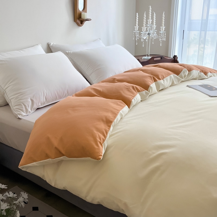 91家纺网 家纺一手货源 找家纺 艾迪尚2025新款100s生态全棉纯色磨毛单品被套杏仁米配天橙色