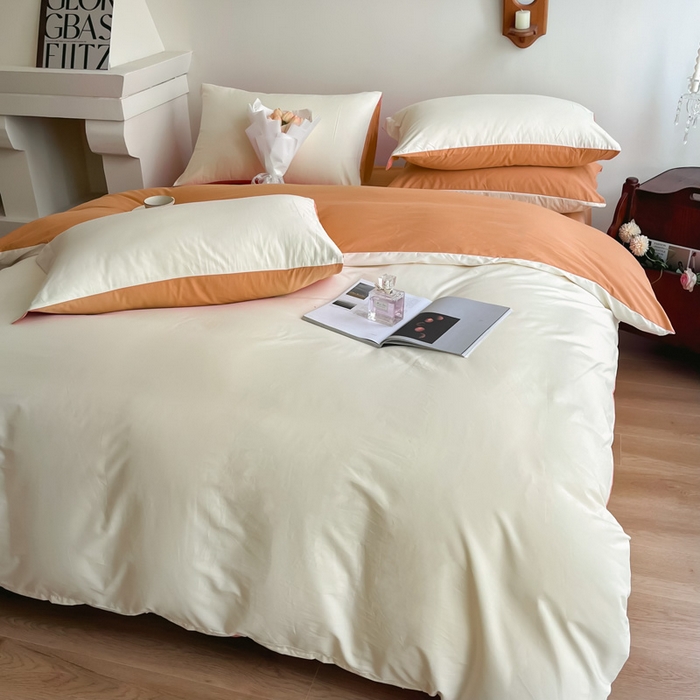 91家纺网 家纺一手货源 找家纺 艾迪尚家纺 2025新款100s生态全棉纯色磨毛四件套 杏仁米配天橙色