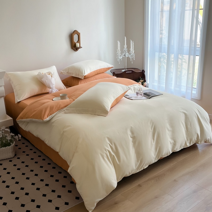 91家纺网 家纺一手货源 找家纺 艾迪尚家纺 2025新款100s生态全棉纯色磨毛四件套 杏仁米配天橙色