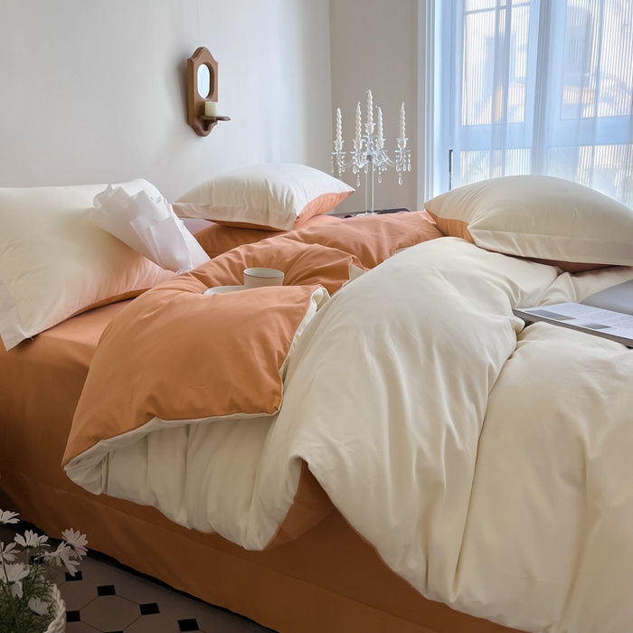 91家纺网 家纺一手货源 找家纺 艾迪尚家纺 2025新款100s生态全棉纯色磨毛四件套 杏仁米配天橙色