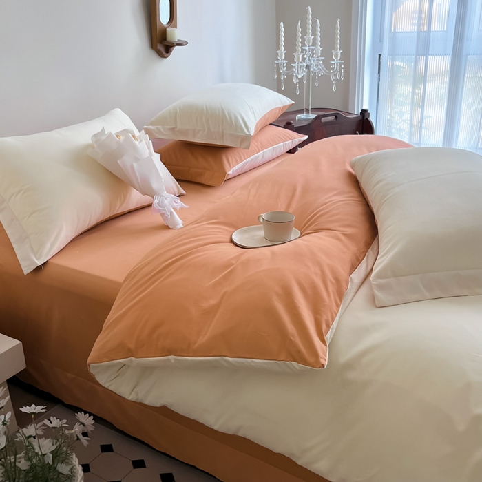 91家纺网 家纺一手货源 找家纺 艾迪尚家纺 2025新款100s生态全棉纯色磨毛四件套 杏仁米配天橙色