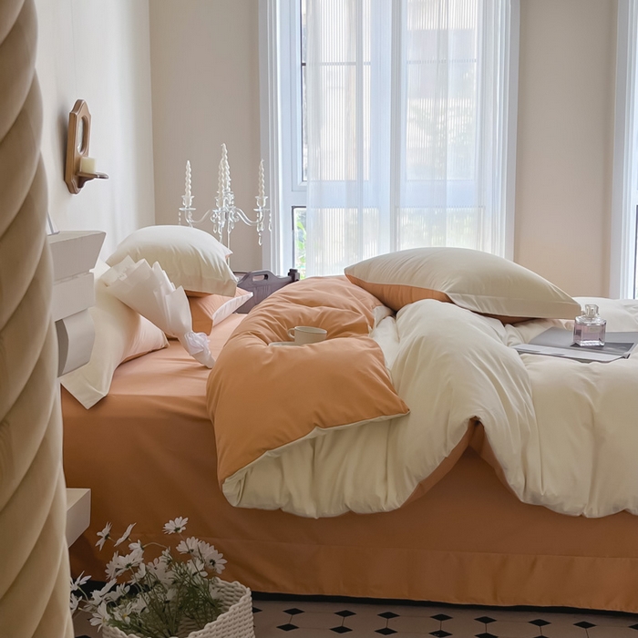 91家纺网 家纺一手货源 找家纺 艾迪尚家纺 2025新款100s生态全棉纯色磨毛四件套 杏仁米配天橙色