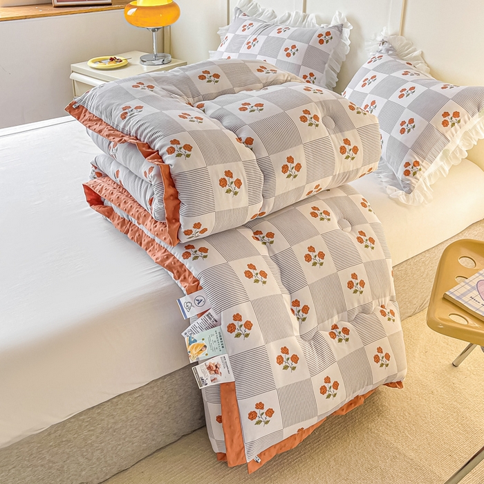 91家纺网 家纺一手货源 找家纺 缦卡琳 2023新款3D按摩拼角豆豆被保暖冬被 格调玫瑰