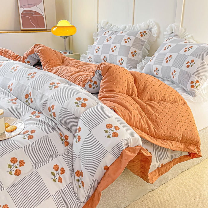 91家纺网 家纺一手货源 找家纺 缦卡琳 2023新款3D按摩拼角豆豆被保暖冬被 格调玫瑰