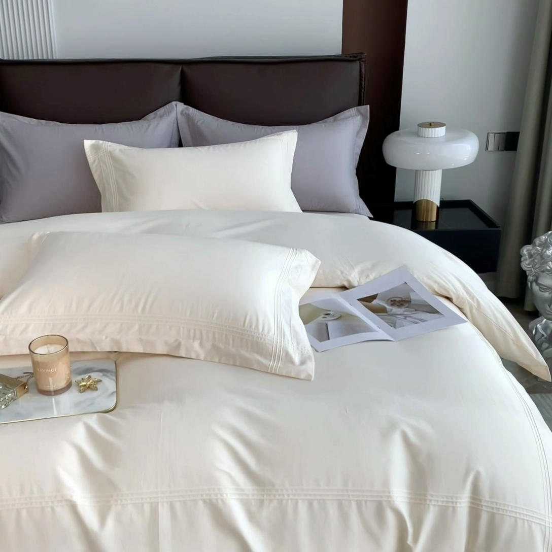 91家纺网 家纺一手货源 找家纺 丝幔 2025新款60S长绒棉埋绳全棉四件套系列 奶昔白