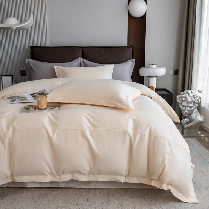 91家纺网 家纺一手货源 找家纺 丝幔 2025新款60S长绒棉埋绳全棉四件套系列 奶昔白