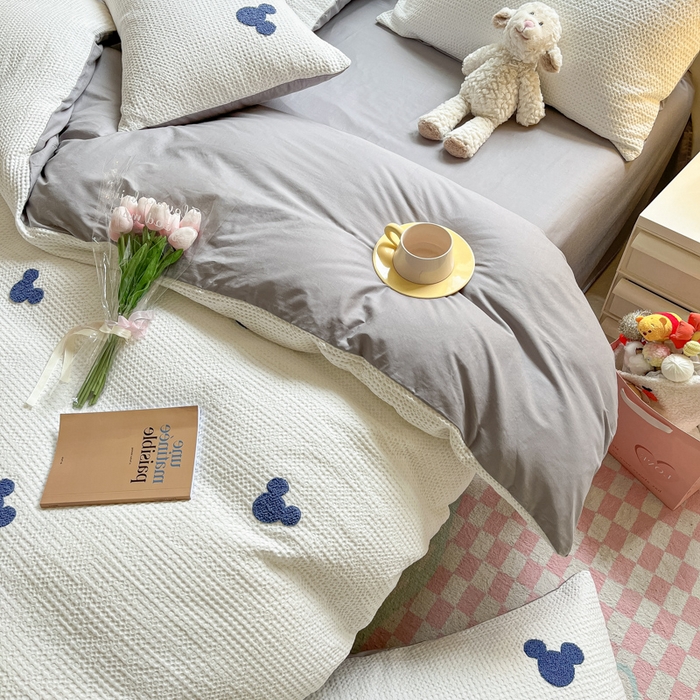 91家纺网 家纺一手货源 找家纺 慕尚2025华夫格全棉米奇毛巾绣四件套 米奇 白灰