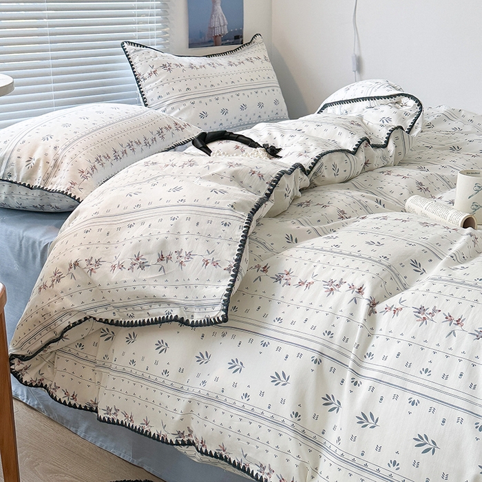 91家纺网 家纺一手货源 找家纺 2023新款全棉印花贝壳三角针四件套 蓝色风信