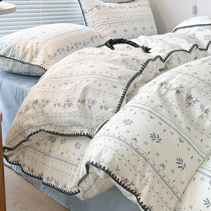 91家纺网 家纺一手货源 找家纺 2023新款全棉印花贝壳三角针四件套 蓝色风信