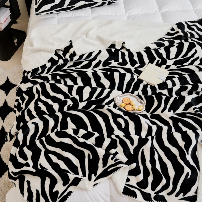 91家纺网 家纺一手货源 找家纺 艾佳 2025新款高克重加厚牛奶绒毛毯系列 毛毯斑马纹