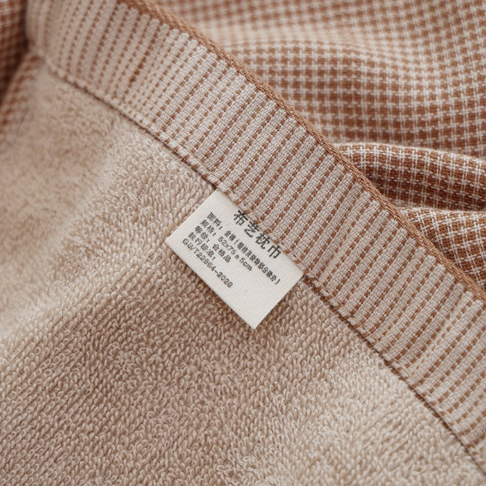 91家纺网 家纺一手货源 找家纺 朴尔家纺-毛巾被 2023年新款全棉无印风纱布毛圈加厚色织提花枕巾 52*78cm*2毛圈双面枕巾-咖小格