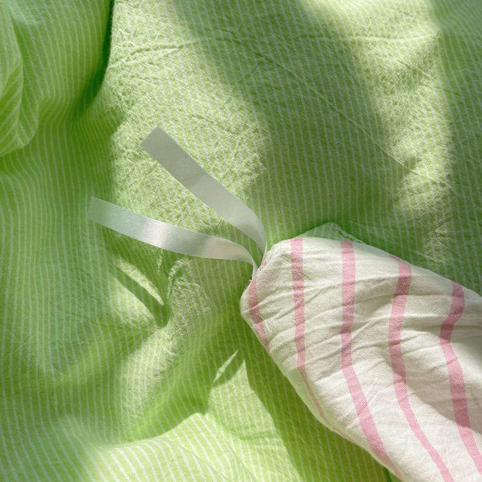 91家纺网 家纺一手货源 找家纺 2023新款ins水洗棉色织大眼睛毛巾绣花多巴胺少女纯棉系列四件套 水洗棉-大眼粉条绿