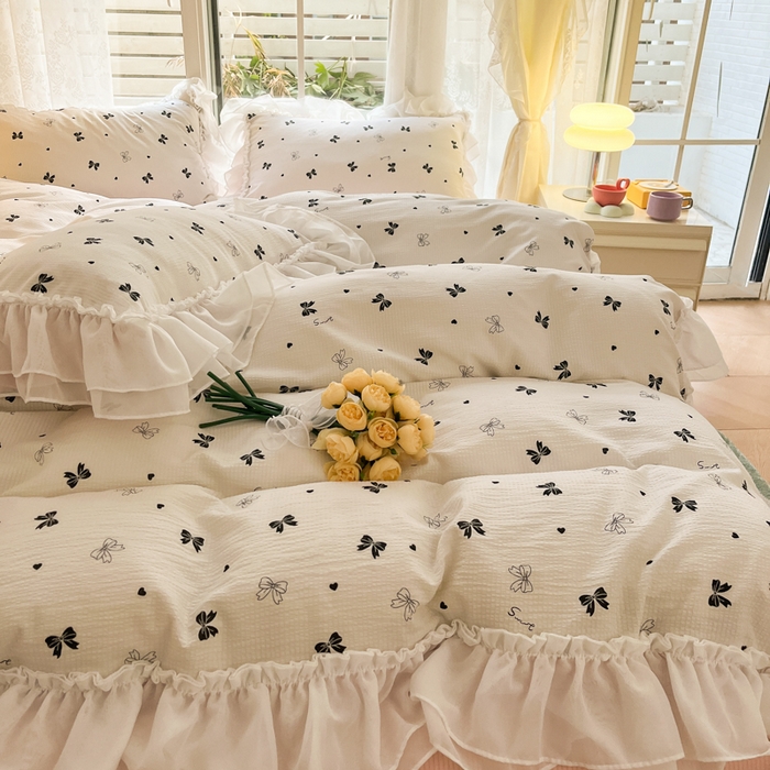 91家纺网 家纺一手货源 找家纺 慕澄 2024新款时尚印花泡泡棉花边四件套 蝴蝶结