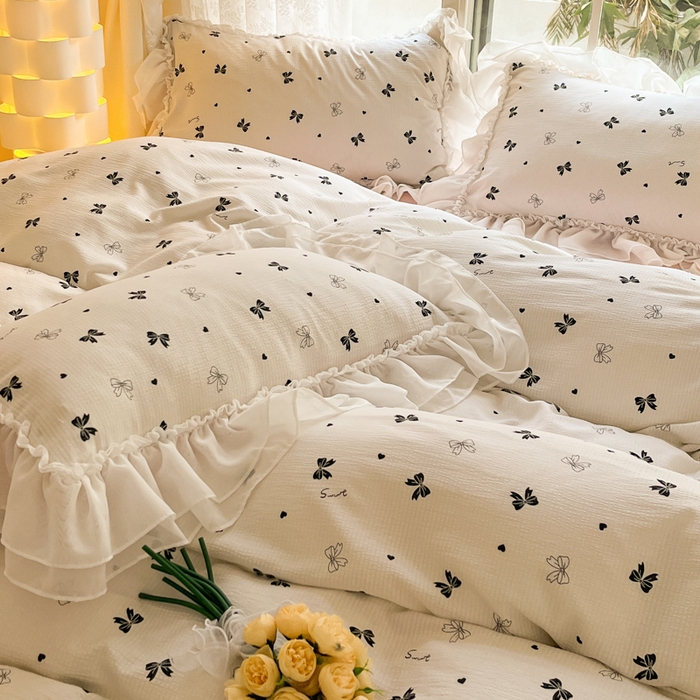 91家纺网 家纺一手货源 找家纺 慕澄 2024新款时尚印花泡泡棉花边四件套 蝴蝶结