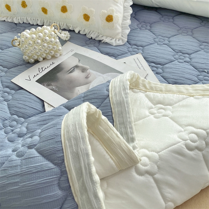 91家纺网 家纺一手货源 找家纺 鑫钰 2024新款A类水洗棉大豆夹棉床护垫 太阳花-宾利蓝