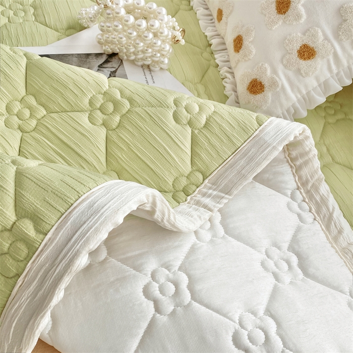 91家纺网 家纺一手货源 找家纺 鑫钰 2024新款A类水洗棉大豆夹棉床护垫 太阳花-抹茶绿