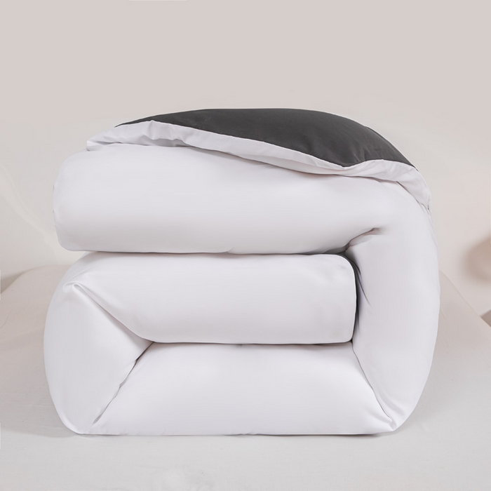 91家纺网 家纺一手货源 找家纺 莎臣豹 2025新款水洗棉磨毛纯色双拼简约风撞色单品被套 纯情白爱上高雅灰