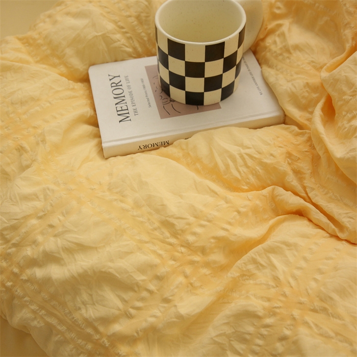 91家纺网 家纺一手货源 找家纺 仟网汇 2024新款韩版简约方格泡泡纱四件套 亮丽黄