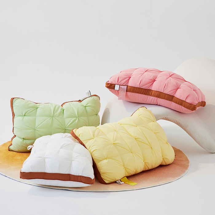 91家纺网 家纺一手货源 找家纺 安莱生活 2024新款5A抗菌早餐派创意系列枕芯-高枕-菠萝包枕 红色48*74cm一只