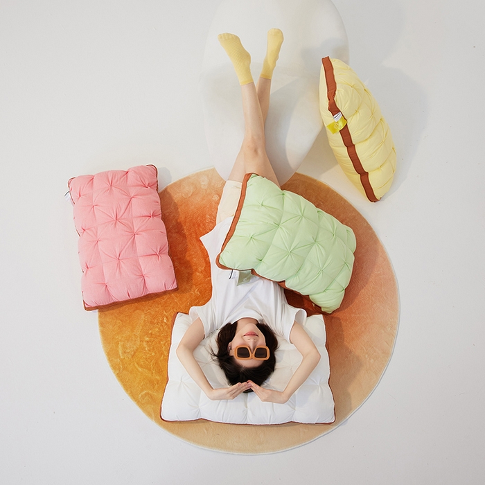 91家纺网 家纺一手货源 找家纺 安莱生活 2024新款5A抗菌早餐派创意系列枕芯-高枕-菠萝包枕 红色48*74cm一只