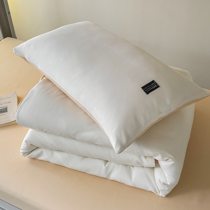 91家纺网 家纺一手货源 找家纺 米瑞娜2024水洗棉麻双拼纯色学生款枕套 奶茶+芝士