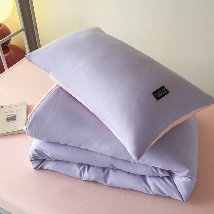 91家纺网 家纺一手货源 找家纺 米瑞娜2024水洗棉麻双拼纯色学生款枕套 丁香紫+西梅粉