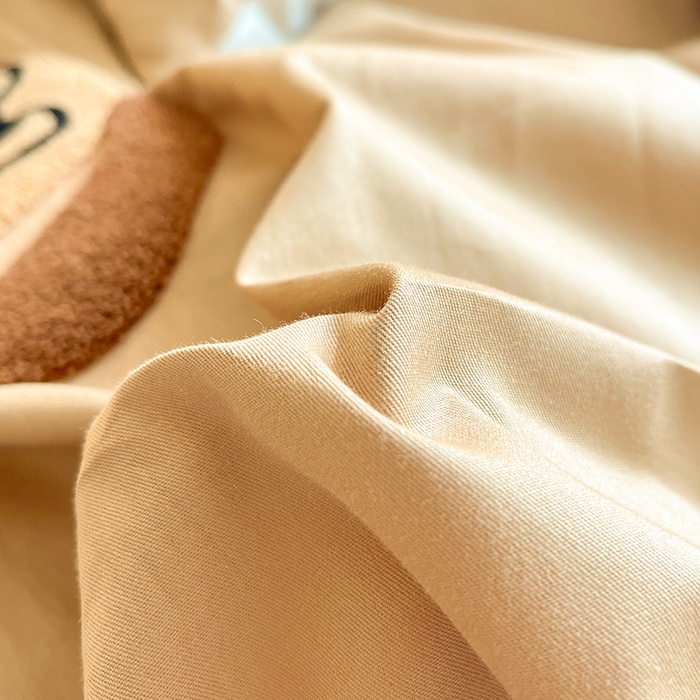 91家纺网 家纺一手货源 找家纺 金丝鸟家纺 2024新款全棉混搭毛巾绣四件套可爱卡通库洛米系列 咖色饼干狗