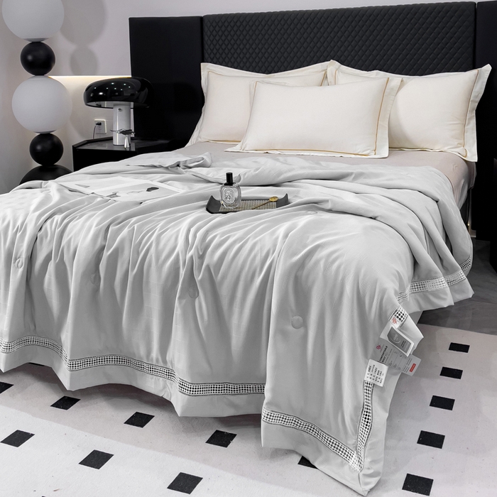 91家纺网 家纺一手货源 找家纺 优姿家纺  2024新品凉感生态提花大豆镂空抑菌夏被 格调优美-高级灰