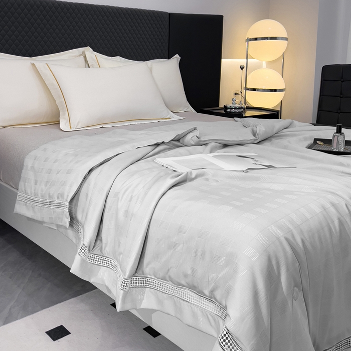 91家纺网 家纺一手货源 找家纺 优姿家纺  2024新品凉感生态提花大豆镂空抑菌夏被 格调优美-高级灰