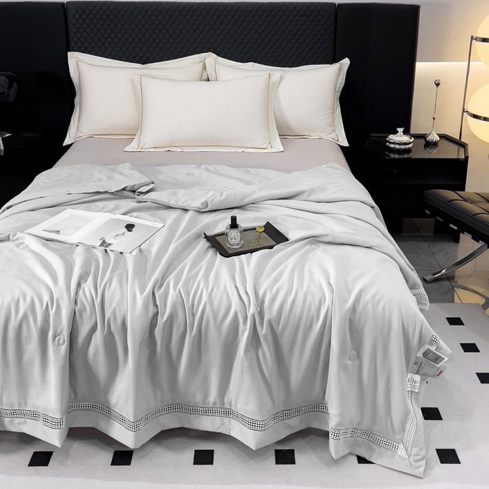 91家纺网 家纺一手货源 找家纺 优姿家纺  2024新品凉感生态提花大豆镂空抑菌夏被 格调优美-高级灰