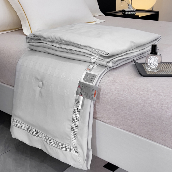 91家纺网 家纺一手货源 找家纺 优姿家纺  2024新品凉感生态提花大豆镂空抑菌夏被 格调优美-高级灰