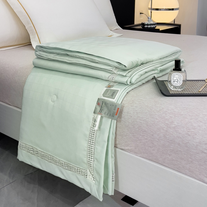 91家纺网 家纺一手货源 找家纺 优姿家纺  2024新品凉感生态提花大豆镂空抑菌夏被 格调优美-清水绿