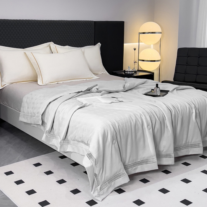 91家纺网 家纺一手货源 找家纺 优姿家纺  2024新品凉感生态提花大豆镂空抑菌夏被 格调优美-高级灰