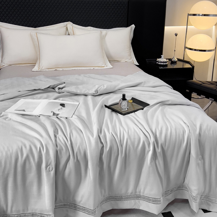 91家纺网 家纺一手货源 找家纺 优姿家纺  2024新品凉感生态提花大豆镂空抑菌夏被 格调优美-高级灰