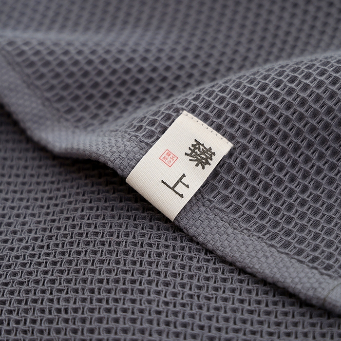 91家纺网 家纺一手货源 找家纺 朴尔家纺-毛巾被 2024新款北欧风素色布标全棉蜂窝华夫格透气枕巾 北欧风-深灰52*78cm