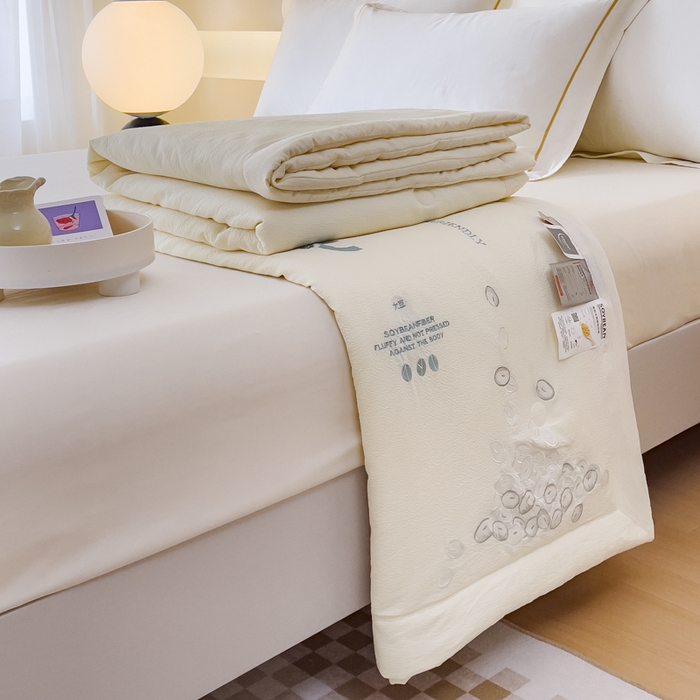 91家纺网 家纺一手货源 找家纺 优姿家纺 2024新款提花泡泡棉刺绣大豆抗菌夏被 米色