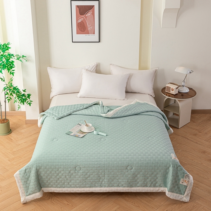 91家纺网 家纺一手货源 找家纺 爱宝被业 2025新款华夫格提花针织棉纤维夏被 水波绿