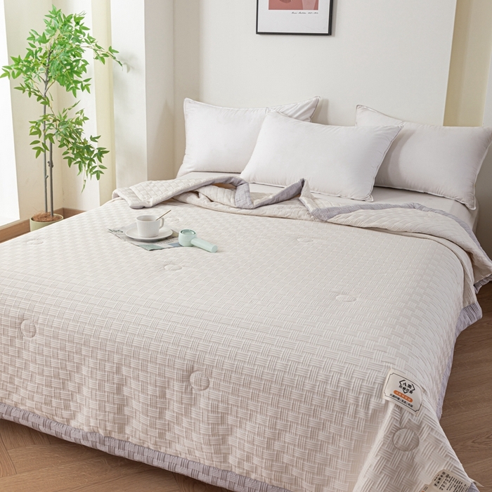 91家纺网 家纺一手货源 找家纺 爱宝被业 2025新款华夫格提花针织棉纤维夏被 奶油白