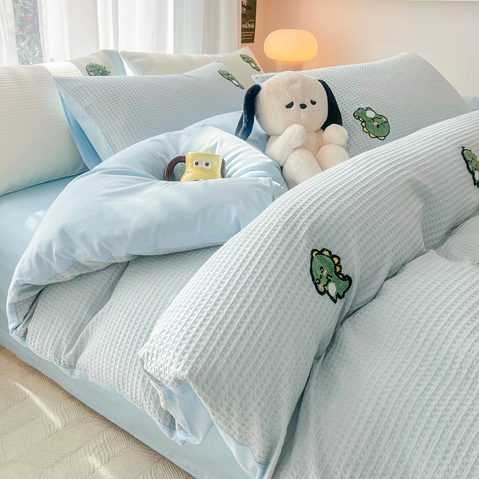 91家纺网 家纺一手货源 找家纺 慕尚 2025新款全棉华夫格毛巾绣四件套 恐龙之王蓝