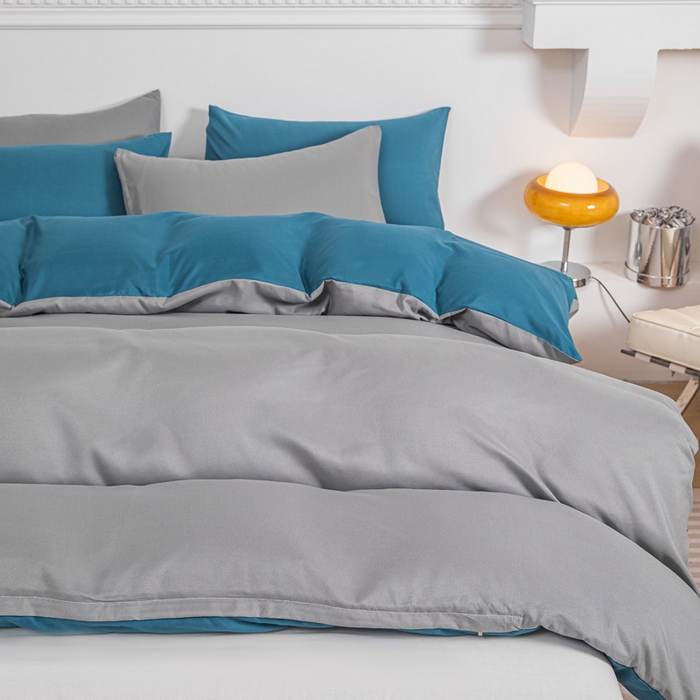 91家纺网 家纺一手货源 找家纺 莎臣豹 2025新款水洗棉磨毛纯色双拼简约风撞色四件套 浅灰爱上宝蓝