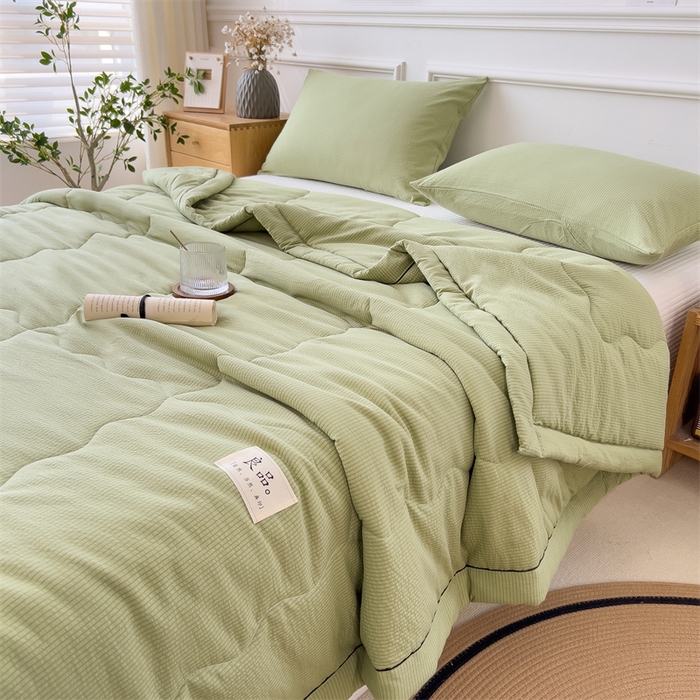 91家纺网 家纺一手货源 找家纺 丝幔家纺 2025新款A类泡泡纱镶边款夏被 牛油果绿