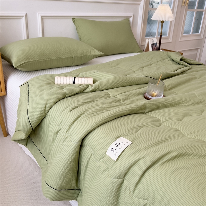 91家纺网 家纺一手货源 找家纺 丝幔家纺 2025新款A类泡泡纱镶边款夏被 牛油果绿