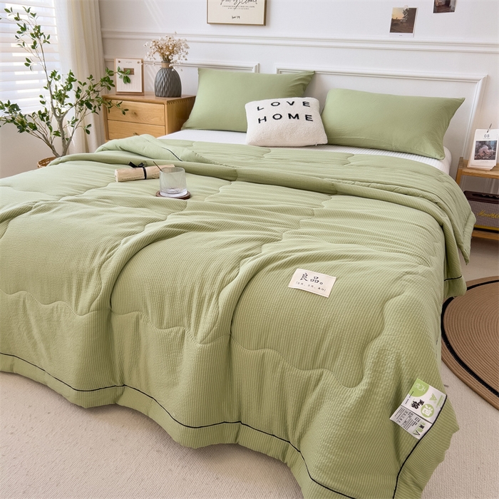 91家纺网 家纺一手货源 找家纺 丝幔家纺 2025新款A类泡泡纱镶边款夏被 牛油果绿