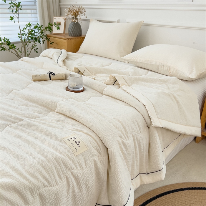 91家纺网 家纺一手货源 找家纺 丝幔家纺 2025新款A类泡泡纱镶边款夏被 珍珠白