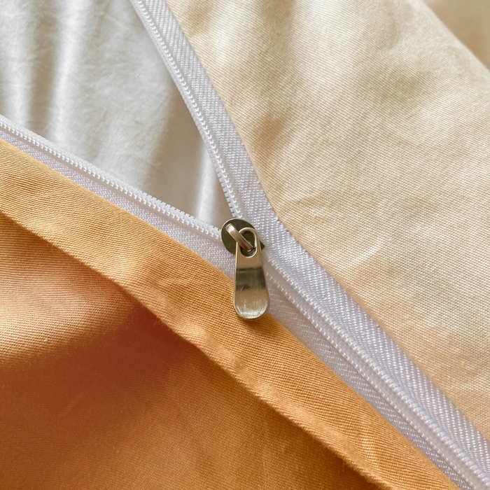 91家纺网 家纺一手货源 找家纺 芊寻家居 2024新款13372全棉纯色四件套无印良品风简约套件 奶白-桔黄